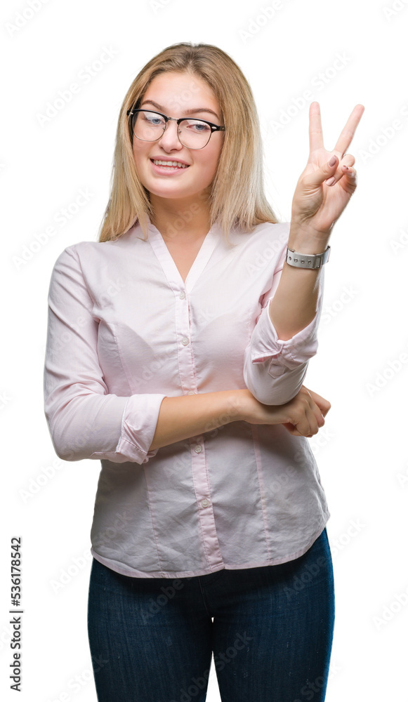 Young caucasian business woman wearing glasses over isolated background smiling with happy face winking at the camera doing victory sign. Number two. Young caucasian business woman wearing glasses over isolated background smiling with happy face winking at the camera doing victory sign. Number two.