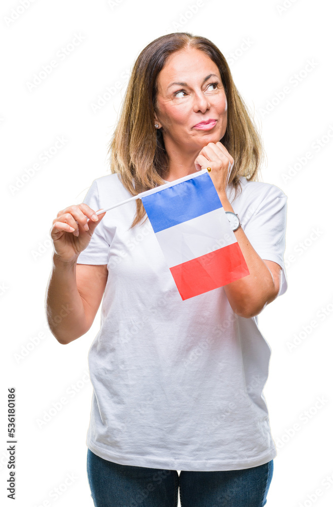 Middle age hispanic woman holding flag of France over isolated background serious face thinking about question, very confused idea Middle age hispanic woman holding flag of France over isolated background serious face thinking about question, very confused idea