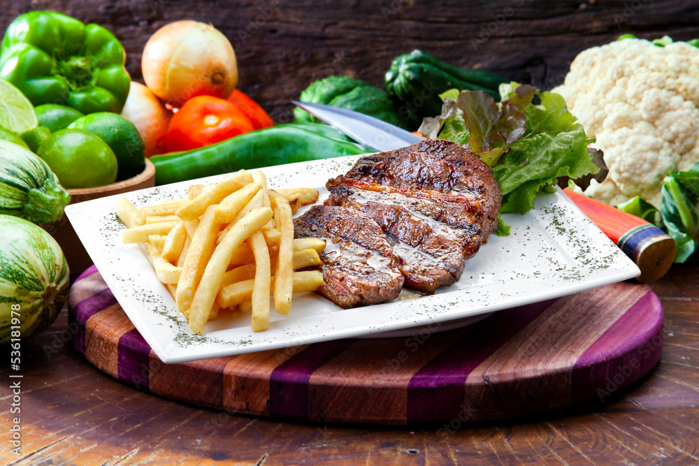 French fries with steak in isolated white background French fries with steak in isolated white background