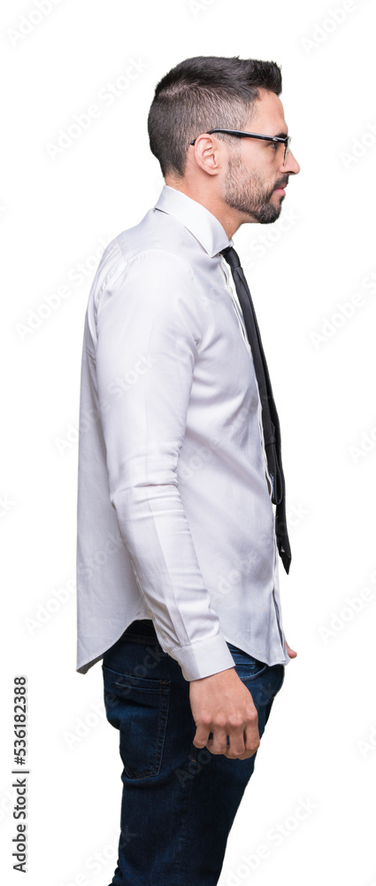 Young handsome business man wearing glasses over isolated background looking to side, relax profile pose with natural face with confident smile. Young handsome business man wearing glasses over isolated background looking to side, relax profile pose with natural face with confident smile.