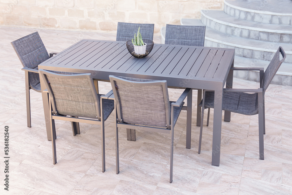 Gray Metal table With 6 Chairs Outdoor In the backyard and garden,made of metal
