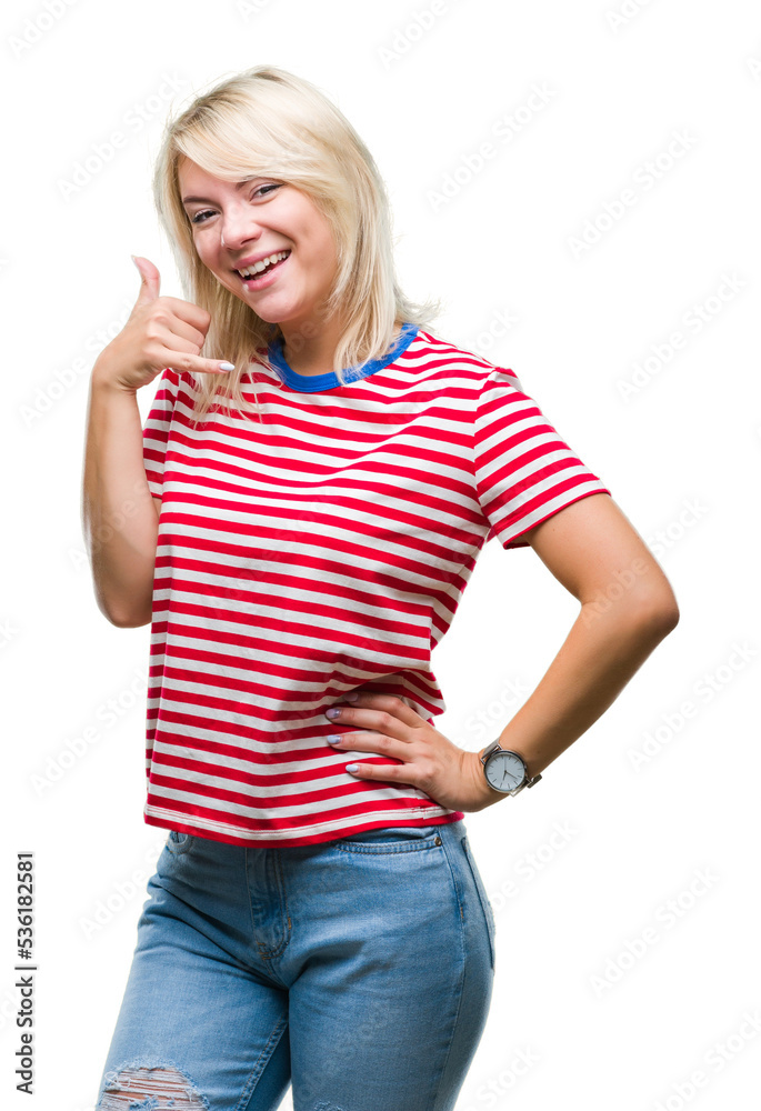 Young beautiful blonde woman over isolated background smiling doing phone gesture with hand and fingers like talking on the telephone. Communicating concepts. Young beautiful blonde woman over isolated background smiling doing phone gesture with hand and fingers like talking on the telephone. Communicating concepts.
