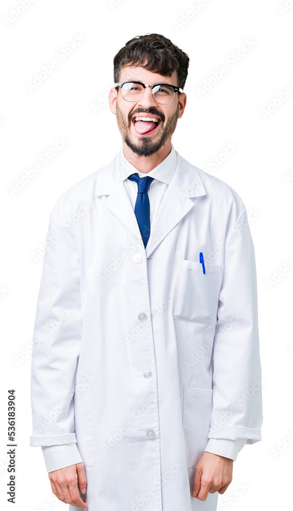 Young professional scientist man wearing white coat over isolated background sticking tongue out happy with funny expression. Emotion concept. Young professional scientist man wearing white coat over isolated background sticking tongue out happy with funny expression. Emotion concept.