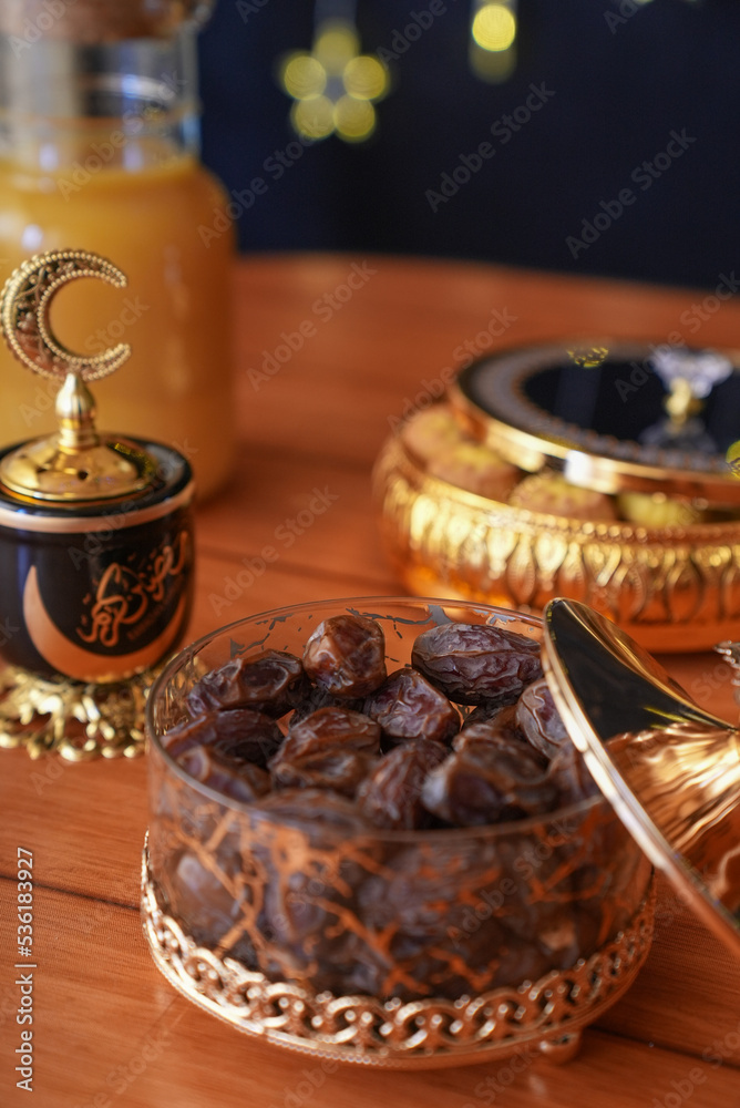 Dried date palm fruits and juice, ramadan food,Ramadan dining table,arabi food
