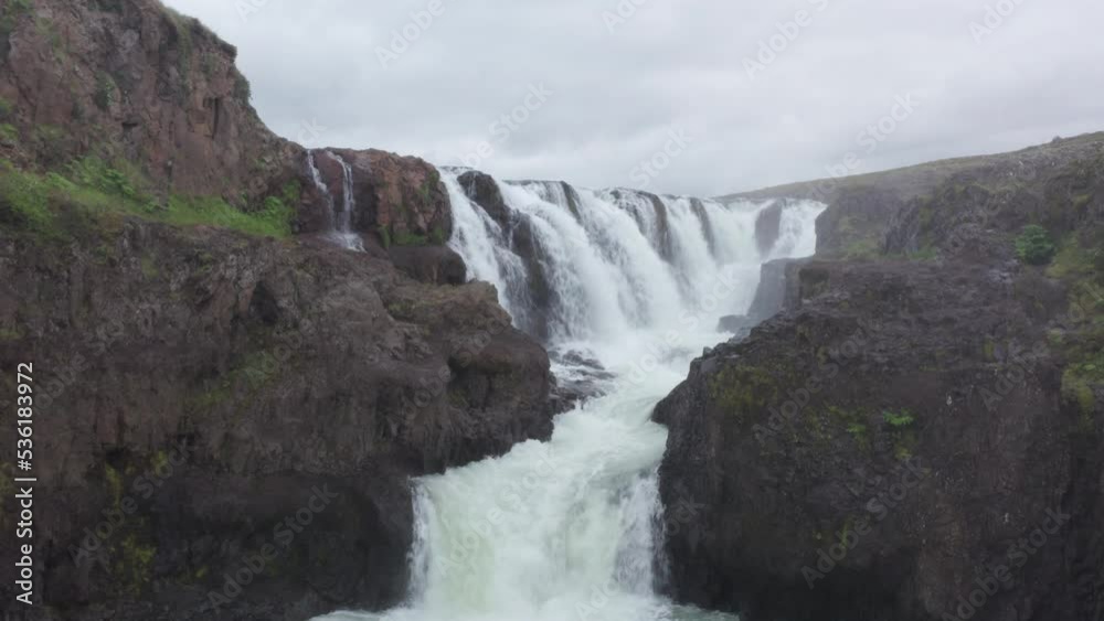 Drone Flight Over Waterfall Through Klougljufur Canyon