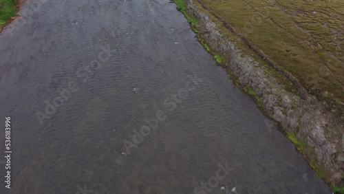 Drone Flight Over River And Waterfall In Klougljufur Canyon photo