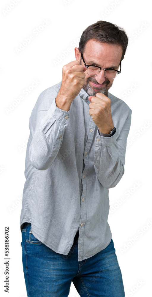 Handsome middle age elegant senior man wearing glasses over isolated background Ready to fight with fist defense gesture, angry and upset face, afraid of problem Handsome middle age elegant senior man wearing glasses over isolated background Ready to fight with fist defense gesture, angry and upset face, afraid of problem