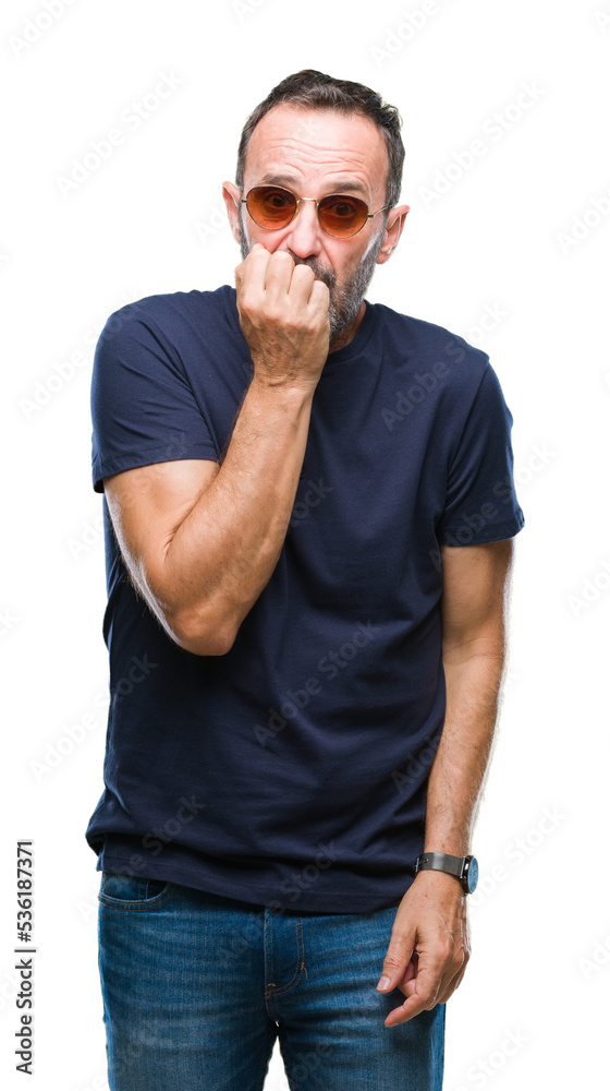 Middle age hoary senior man wearing sunglasses over isolated background looking stressed and nervous with hands on mouth biting nails. Anxiety problem. Middle age hoary senior man wearing sunglasses over isolated background looking stressed and nervous with hands on mouth biting nails. Anxiety problem.