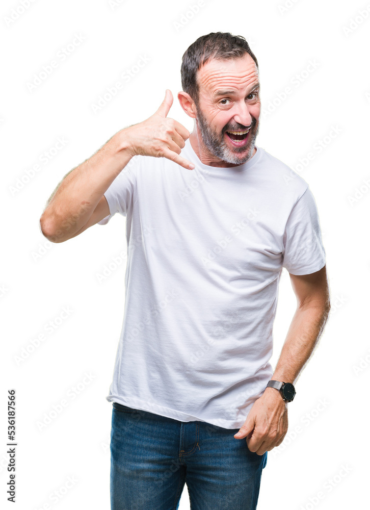 Obraz premium Middle age hoary senior man wearing white t-shirt over isolated background smiling doing phone gesture with hand and fingers like talking on the telephone. Communicating concepts.