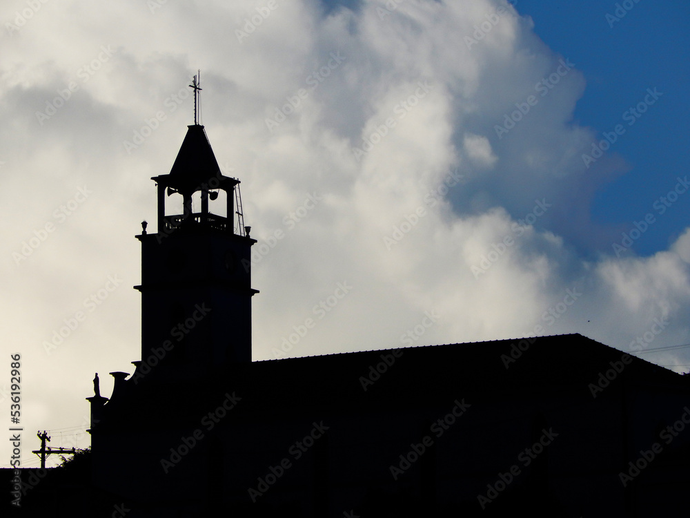 Church silhouette in the clouds