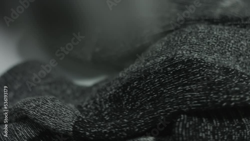 Socks Fall Into Frame Rotating White Background 4K photo