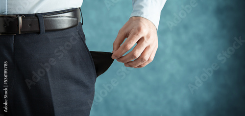 Man showing empty pocket photo