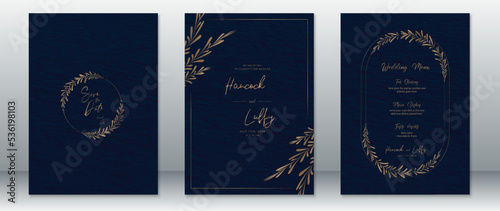 Wedding invitation card template luxury design with gold leaf wreath frame and dark navy background