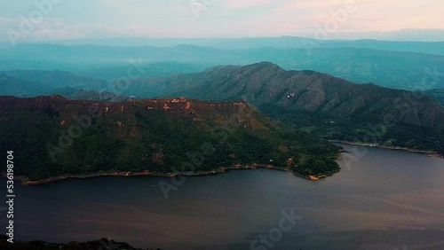 Kinematic aerial view of the beautiful dam of prado in tolima colombia. inland sea of the country. concept of vacations or landscapes