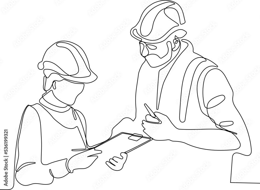 construction manager and engineer working on building site