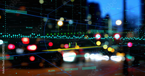 Image of financial data processing against night city traffic © vectorfusionart
