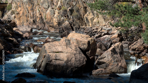 Boulders and whitewater rapids on the Cache La Poudre Wild and Scenic River in Colorado