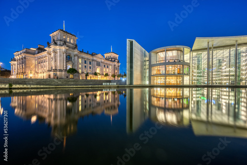 The Reichstag and the Paul-Loebe-Haus at the river Spree in Berlin at night