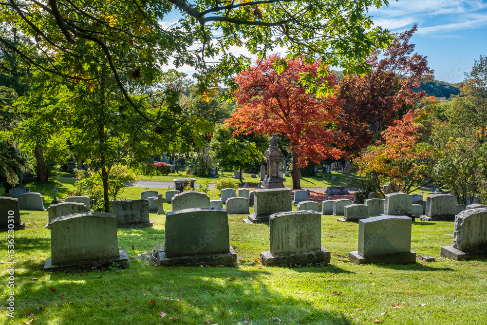 Tombstones at Montreal Cemetery in Autumn Tombstones at Montreal Cemetery in Autumn