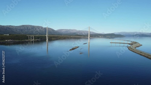 the majestic helgelandsbrua, helgelands bridge, in nordland county with car traffic aerial overview video photo