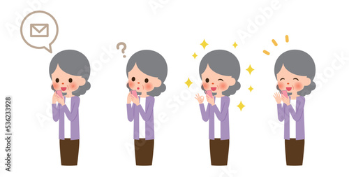 スマホを使用するシニア女性のイラスト素材