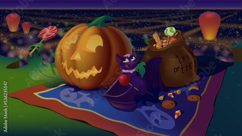 Halloween. Picnic. Jack o'lantern (pumpkin) and a bat with a sack of candy at a Halloween picnic on the outskirts of the city. A view from the hill of the night city with Chinese lanterns.