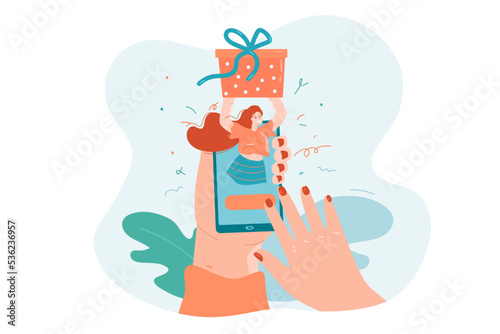 Hands of person sending present to friend through phone app. Happy woman holding gift box flat vector illustration. Delivery service, ecommerce concept for banner, website design or landing web page