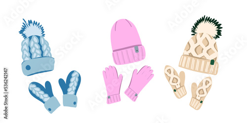 Winter set of pink, beige and blue hat and mittens or gloves isolated on white background. Flat vector illustration.