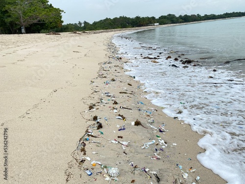 Dirty, Garbage Polluted beach, Environment Issues photo