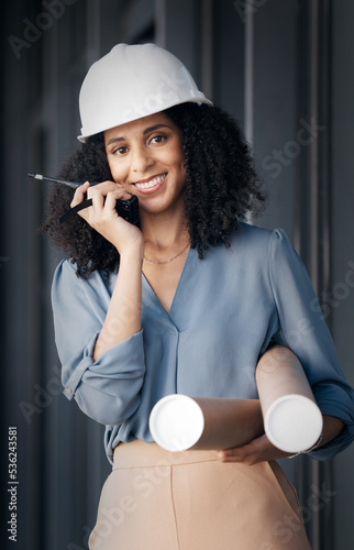 Engineer, black woman and walkie talkie with documents tube for engineering or architecture industry blueprints. Portrait, female smile and happy technician from Brazil with radio for communication © Mia B/peopleimages.com