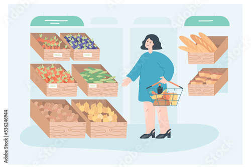 Customer with basket choosing goods on shelves of grocery store. Funny woman buying healthy fruits and vegetables, thinking about purchases flat vector illustration. Supermarket, consumerism concept