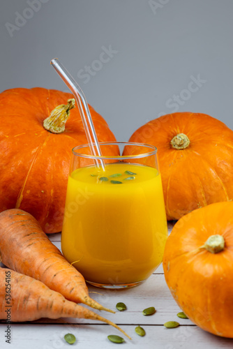 Vegetable smoothie or pumpkin and carrot juice. Useful and healthy food.