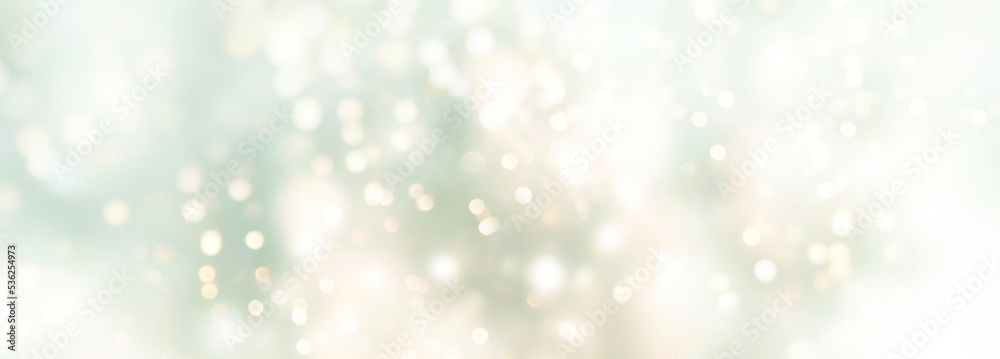 Abstract blue and green bokeh background - Christmas and Winter concept - Blurred bokeh light and snowflakes	
