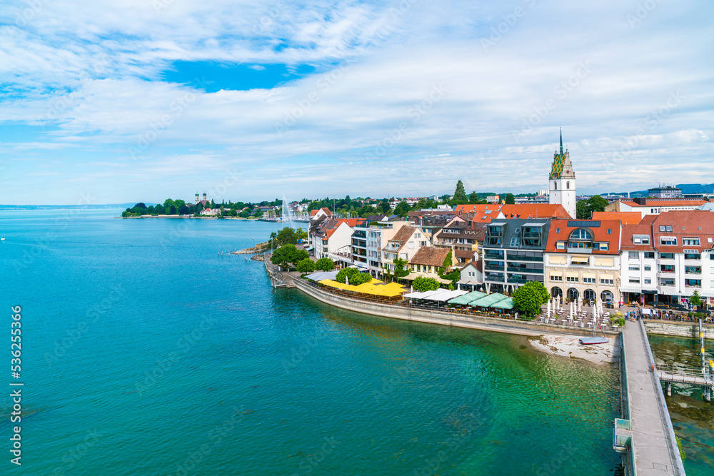 Germany, Friedrichshafen city coast of bodensee lake, houses at promenade lakeside in summer, aerial panorama view above