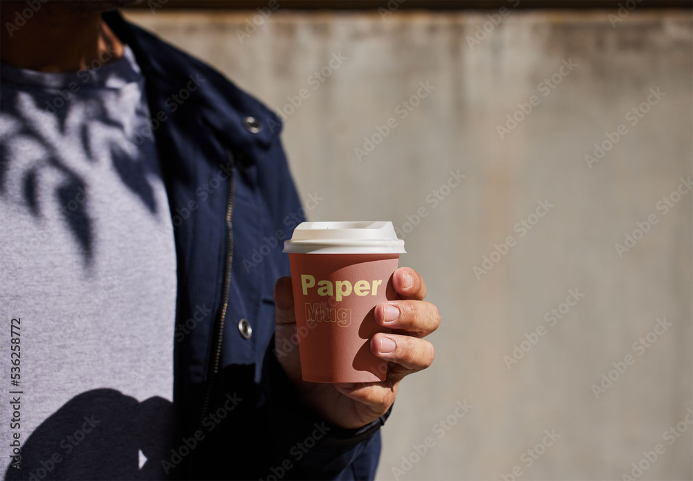 Coffee Paper Cup Mockup Holded By a Man Stock Template | Adobe Stock