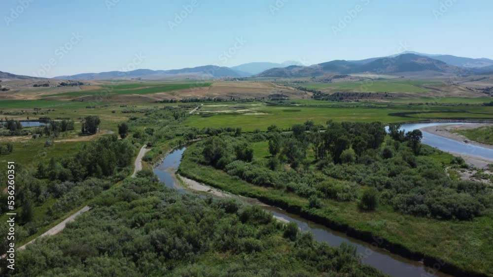 Straight up aerial shot of the drone in beautiful park surrounded by mountains Straight up aerial shot of the drone in beautiful park surrounded by mountains