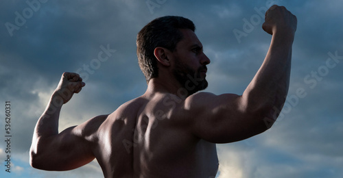 strong shirtless man. bodybuilder man with muscular torso. athlete man with biceps and triceps