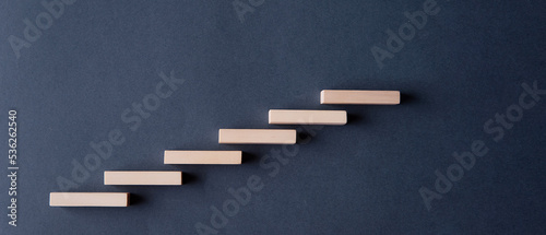 Steps made of wooden blocks. The concept of achieving success, 