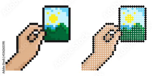 Pixel icon. Hand holds paper photograph. Memories of vacation or trip to nature. Printing photos. Simple retro game vector isolated on white background