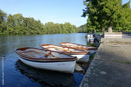Rowing boats for hire beside the River Thames at Taplow, Buckinghamshire, England, UK photo