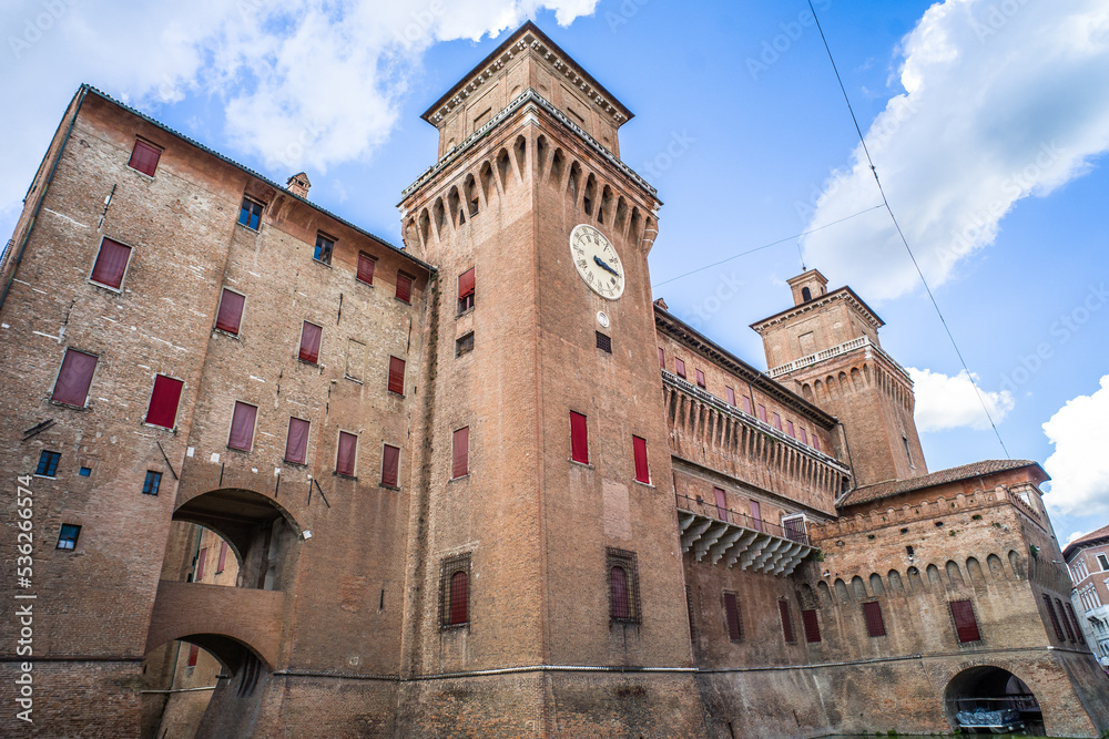 wide-angle close-up of the brick building of the Castle d'Este in Ferrara