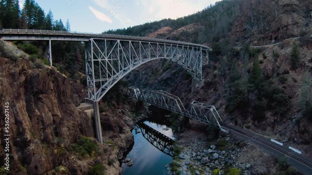 FPV drone shot over the bridge at the Feather River Canyon, in California, USA FPV drone shot over the bridge at the Feather River Canyon, in California, USA