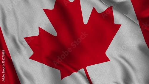 Canadian flag, waving in the wind and with a country map in the Canadian flag pattern. It is a composite garden of Footage.