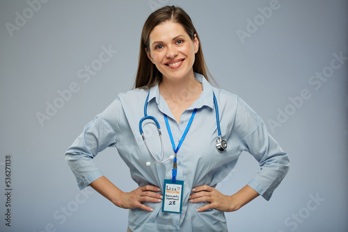 Smiling doctor woman in blue shirt with stethoscope isolated portrait of female medical worker.