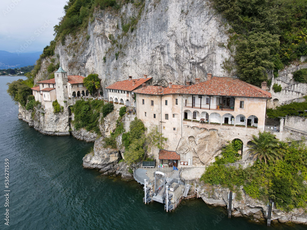 Drone view at the monastery of Santa Caterina del Sasso on lake Maggiore, Italy