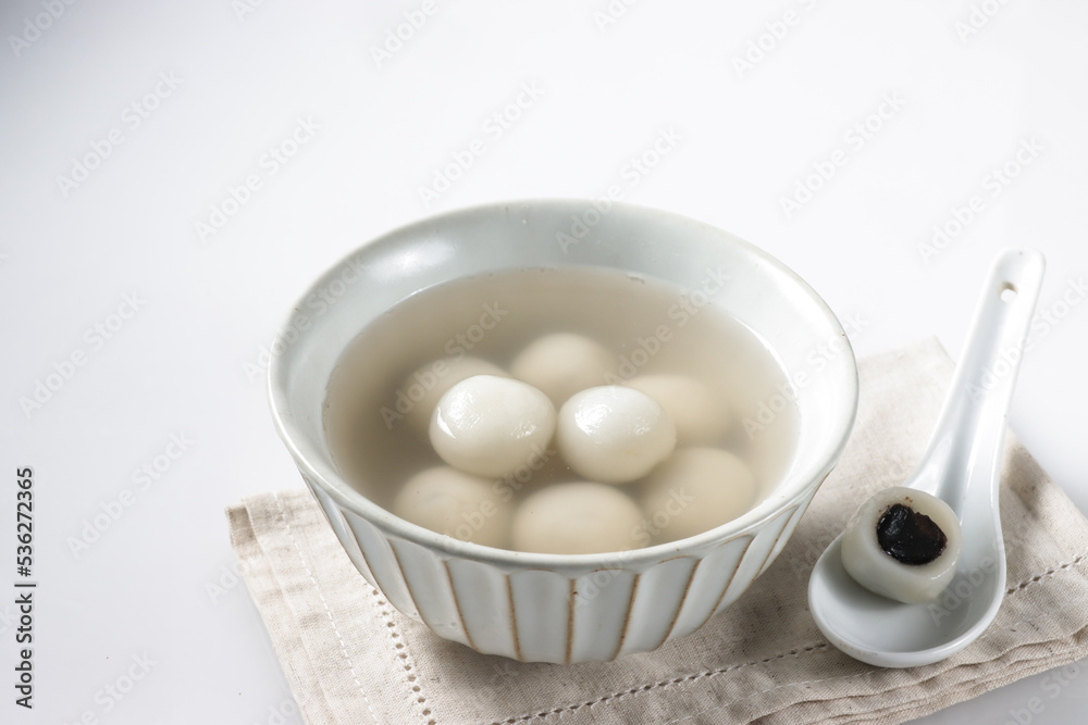 Tangyuan, glutinous rice dumpling fill with black sesame seeds paste. Tangyuan, glutinous rice dumpling fill with black sesame seeds paste.
