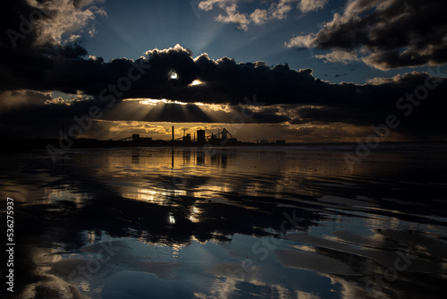 Clouds over British Steel reflections photo