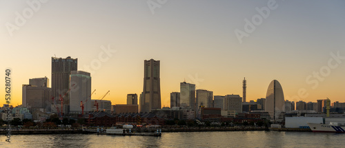 Wide panorama of Yokohama Minato Mirai 21 seaside urban area in Japan at dusk 