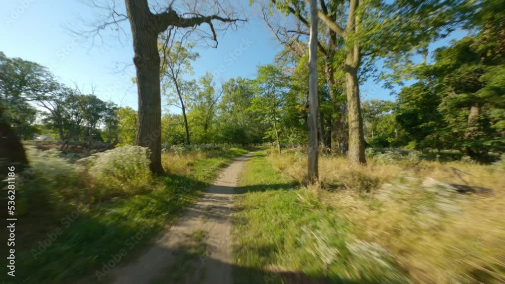 single track dirt gravel path biking and run. Smooth first person view POV cycling ride and running single track dirt gravel path biking and run. Smooth first person view POV cycling ride and running