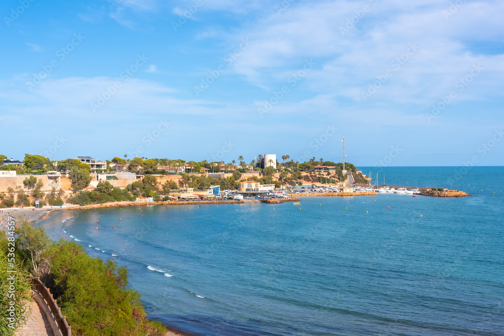 View of the Caleta beach in the tourist town of Cabo Roig. Alicante